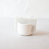Selegna diatomite sponge holder in beige small, compact drying rack for a tidy sink area.