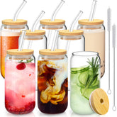 SENTVEND 16 oz glasses with bamboo lids and glass straws for stylish iced beverages.