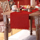 SevenFish Christmas table runner in red burlap adds rustic holiday charm
