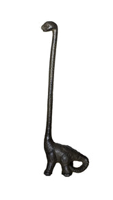 Sheff dinosaur cast-iron paper towel holder on rustic counter for towel organization