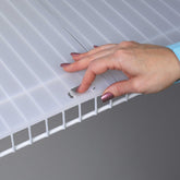 Shelf-IT wire shelf liner roll for 12-inch depth creates a smooth surface.