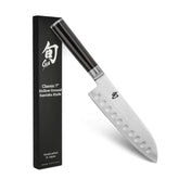 Shun Classic 7-inch hollow-ground Santoku blade ready for precise slicing and reduced sticking