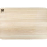 Shun Hinoki cutting board medium top view with knife-friendly surface that preserves edges.