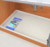 SIKADEER under-sink mat with raised edges protecting cabinets
