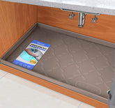 SIKADEER under-sink mat with raised edges protects cabinets from leaks and spills