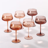 SIPBYSOP Venus Coupe amber diamond glass enhances vibrant cocktails and presentation.