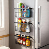 SleekStore 3-piece cabinet door storage box set mounted on a kitchen door for spice jar organization.