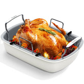 Slow Slog nonstick turkey roasting pan with rack for easy food release and fat drainage.