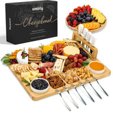 Smirly charcuterie board setup with fruit and cheese for entertaining.