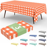 Smiry orange gingham disposable tablecloth 54x108 perfect for outdoor dining and easy cleanup.
