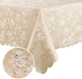 Smiry beige rectangle table cloth drapes elegantly over a beige dining table, protecting the surface