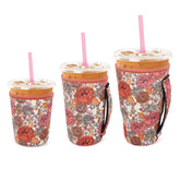 Snowso Flower Power small sleeve on 16-18 oz cup with comfy grip
