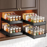 SNTD pull-out spice rack upper cabinet for quick access and organized jars.