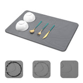 Snuggery large stone drying mat on counter for quick moisture absorption.