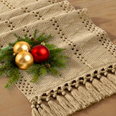 Socomi boho table runner macrame champagne drape on a rustic dining setup for cozy dinner styling
