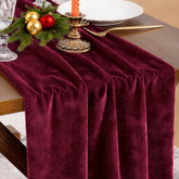 Socomi burgundy red velvet table runner on dining table adds elegant ambience