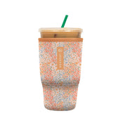 Sok It JavaSok floral sleeve on large iced coffee for on-the-go use