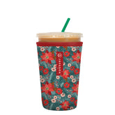 Sok It JavaSok iced coffee sleeve in pastel poinsettias keeps drinks cold and hands dry.