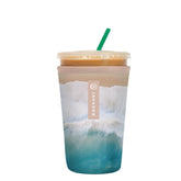 Sok It JavaSok insulated neoprene sleeve on iced coffee cup improves grip and keeps drinks cold.