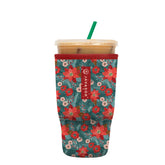 Sok It JavaSok pastel poinsettias sleeve on a large 30-32oz cup, keeping hands dry and stylish.