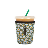 Sok It JavaSok sleeve on chamomile china cup keeps drinks cold and reduces condensation.