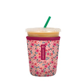 Sok It JavaSok spring bouquet sleeve on cup, protecting from spills while keeping drinks cold.