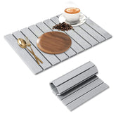 SOKINCLR stone drying mat unfolded on counter showing quick absorption for dishes