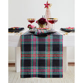 Solino Home Jewel Plaid table runner in black elevating an elegant dining setup