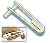 Spill-Stop Olive Express olive stuffer front view – quick filling compared to traditional tools.