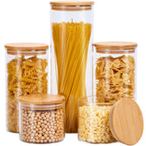 Spreccio glass storage jars with bamboo lids in a five-jar set for organized pantry storage.