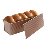SS&CC Pullman loaf pan with lid shows even heat and uniform slices