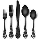 Stapava 30-piece black silverware set displayed on dining table for an elegant meal