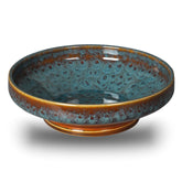 STE-CER Peacock bowl front view on counter, decorative pedestal centerpiece