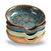STE-CER ceramic spoon rest on stovetop keeps counters clean and grease-free.