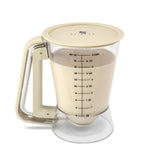 STIRLEX batter dispenser with pour spout delivers smooth portioning for even batters.