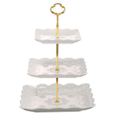 Sumerflos 3-tier porcelain cupcake stand during assembly with sturdy joints and elegant design for parties.