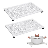 Sumnacon white rectangle cast iron trivet protects surfaces from heat.