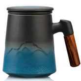 Suyika tea cup with infuser and lid, gradient black-blue design for flavorful brewing.
