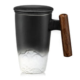 Suyika Tomotime tea cup with infuser and lid in black, easy brewing.