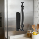 Swaitee magnetic paper towel holder attached to fridge door for secure, quick access