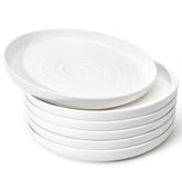 Sweese porcelain dinner plates with ripple design add artisanal charm to meals.