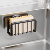 Taili sponge holder on kitchen sink showing strong suction securing sponges