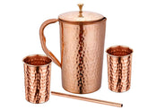 Taluka hammered copper water pitcher with lid for elegant home hydration and garnish-free serving.