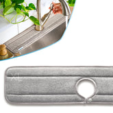 Ternal Sinkmat drip catcher around the faucet absorbs spills to keep counters dry.