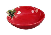 The Bridge Collection tomato spoon rest bowl on a kitchen counter keeps utensils tidy.