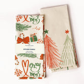 The Fine Living Co. Merry Christmas towels in cherry red and green, folded for festive decor.