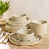 TheTerra ceramic dinner plate in speckled glaze showing a dining setup and subtle color variation