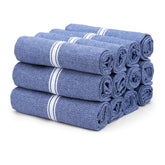 THREAD SPREAD kitchen towels in blue chambray demonstrate durable cotton for everyday use.