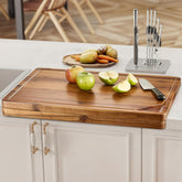 Tidita acacia cutting board with handle offers stable, spacious prep surface.