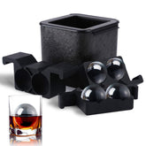 TINANA crystal clear ice ball maker with four large spheres for whiskey and cocktails.